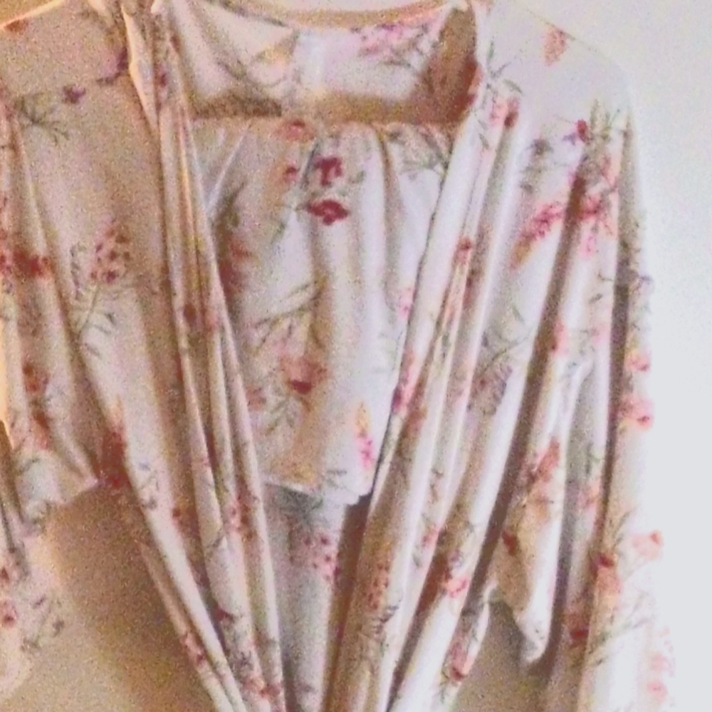 This a PJ set comes with a pair of shorts to sleep in and a sexy short robe